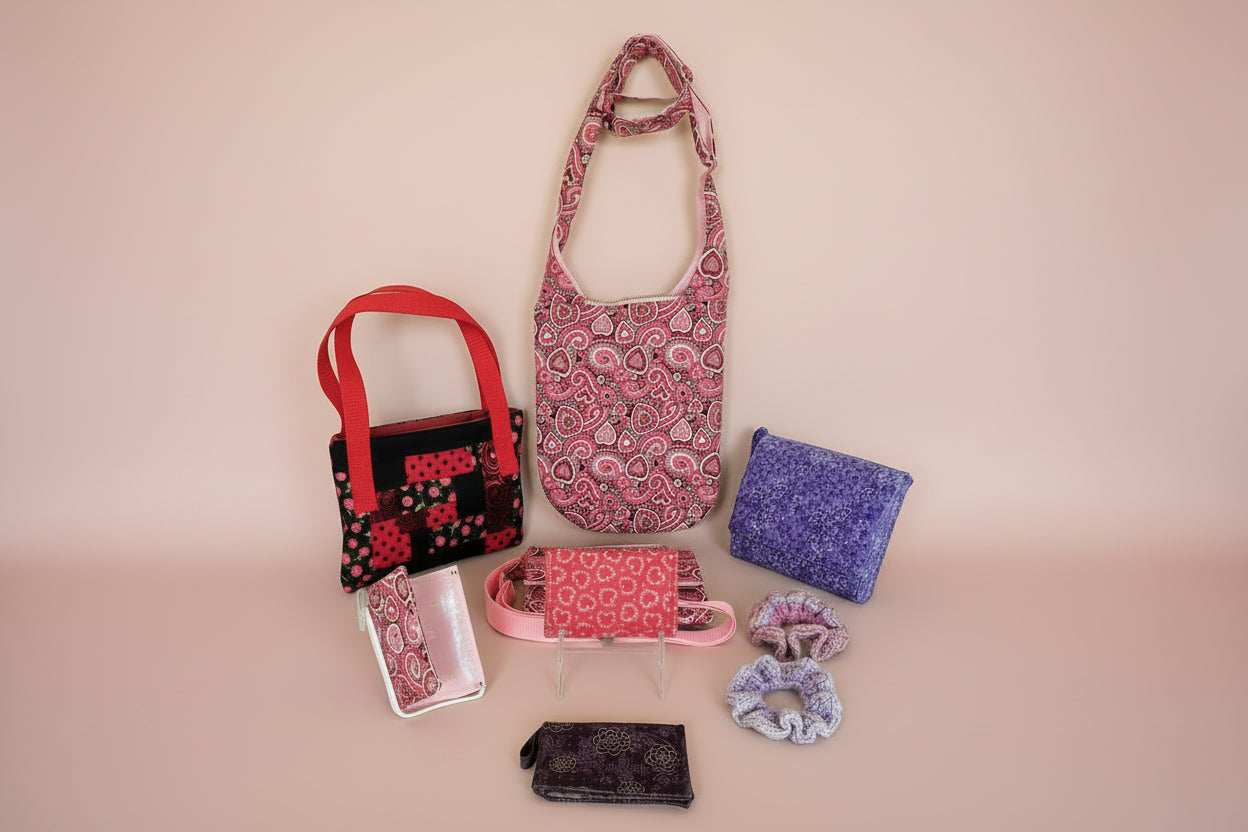 This is the Valentine's Day line. This includes three Angelicas, three flores purses, four wallets, two tracy toe bags and two scrunchies.