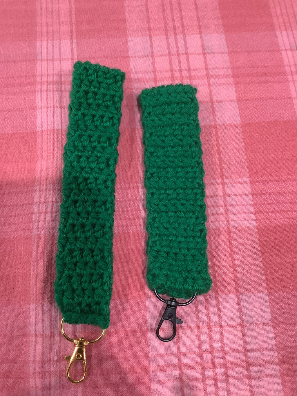 Two key crochet bracelets in green. One is size nine and the second is size 8 in inches.